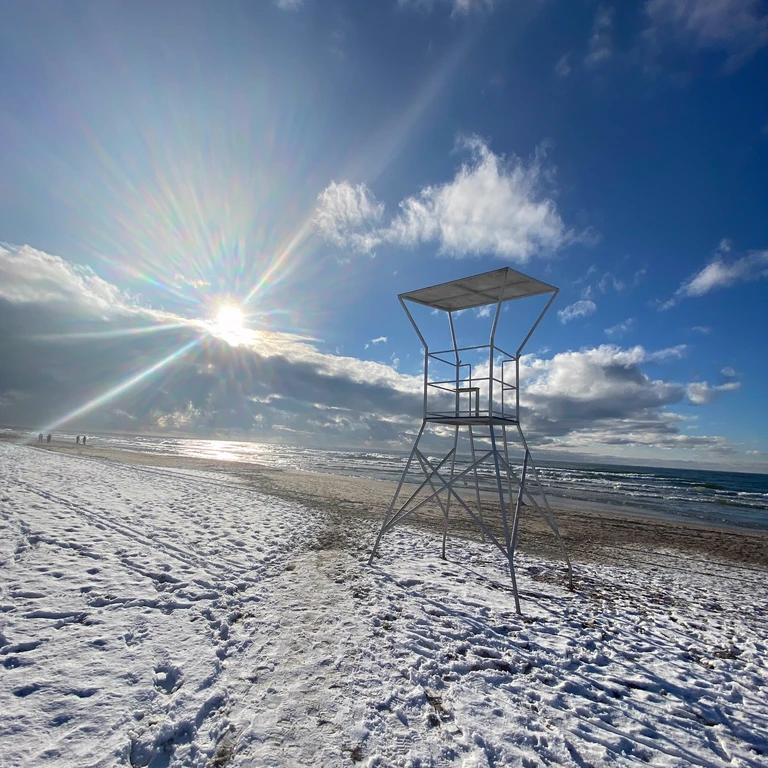 Rimante, Senior Technical Support Manager at mailerlite enjoying sunny day in the beach